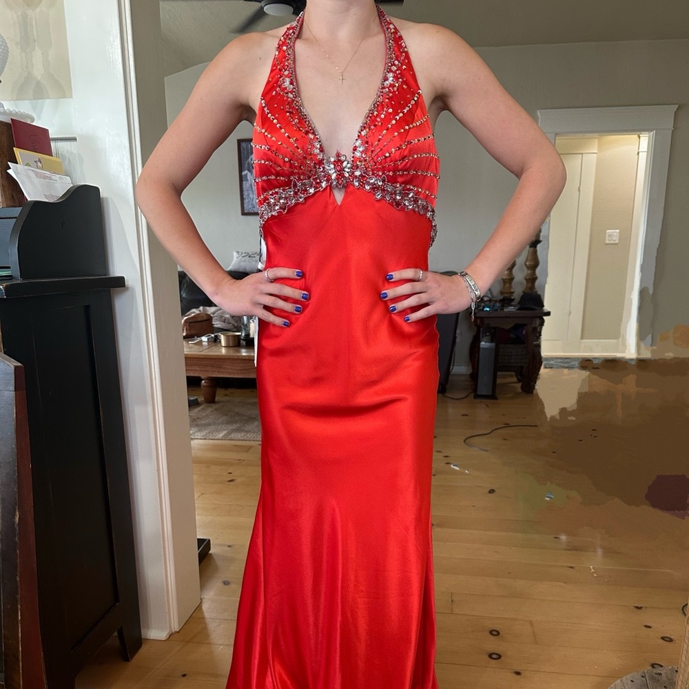 Elegant Red Gown with Beaded Detail. Prom dress